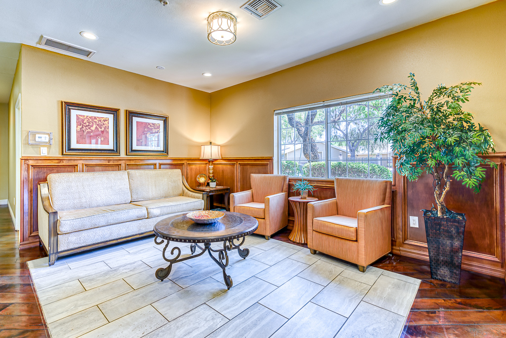 common area with sofa and chairs